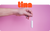 Hand holding a tampon against a pink background. The orange Tina Healthcare logo is centered at the top.